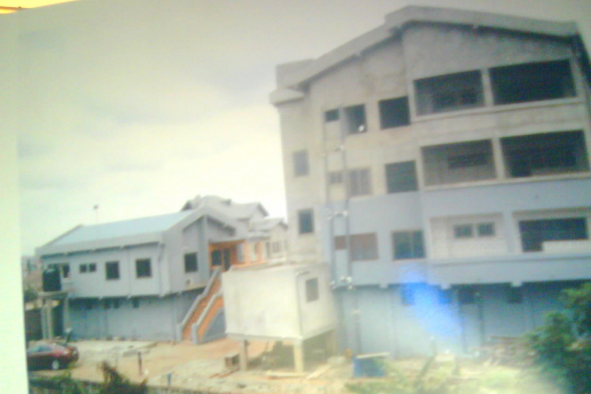 back view of house and stores for rental